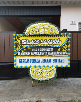 Papan Bunga Duka di Sawa Erma